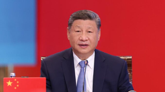 Xi